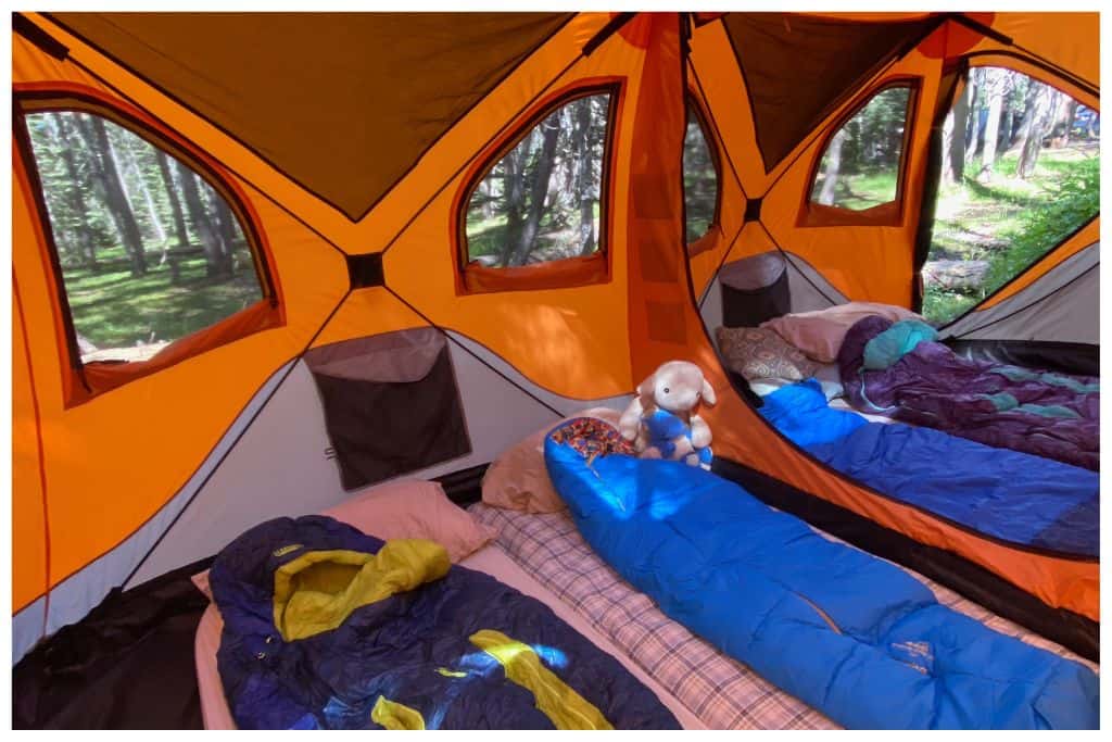 Inside of a tent. Camping's affordability makes it appealing.